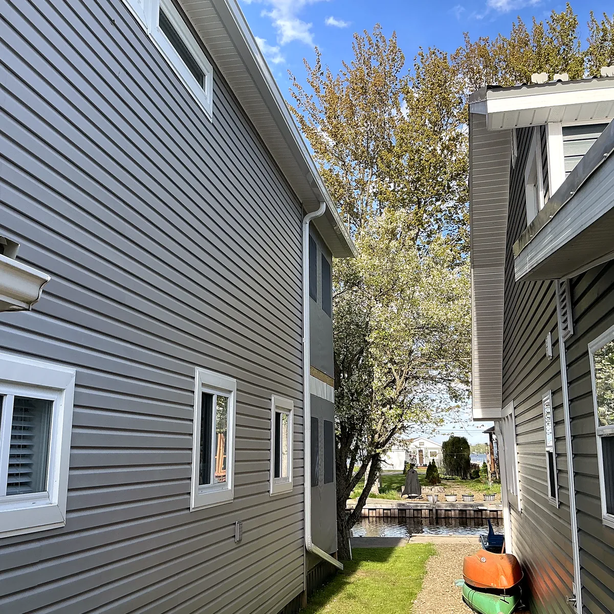 Residential exterior siding project showing a clean side elevation and finished trim.