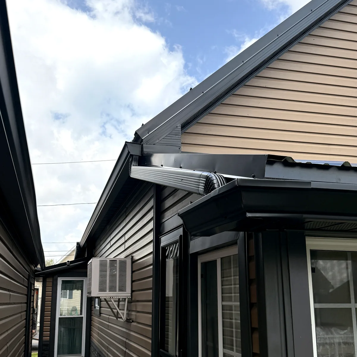 Roofline and siding detail showing exterior finish and trim alignment.